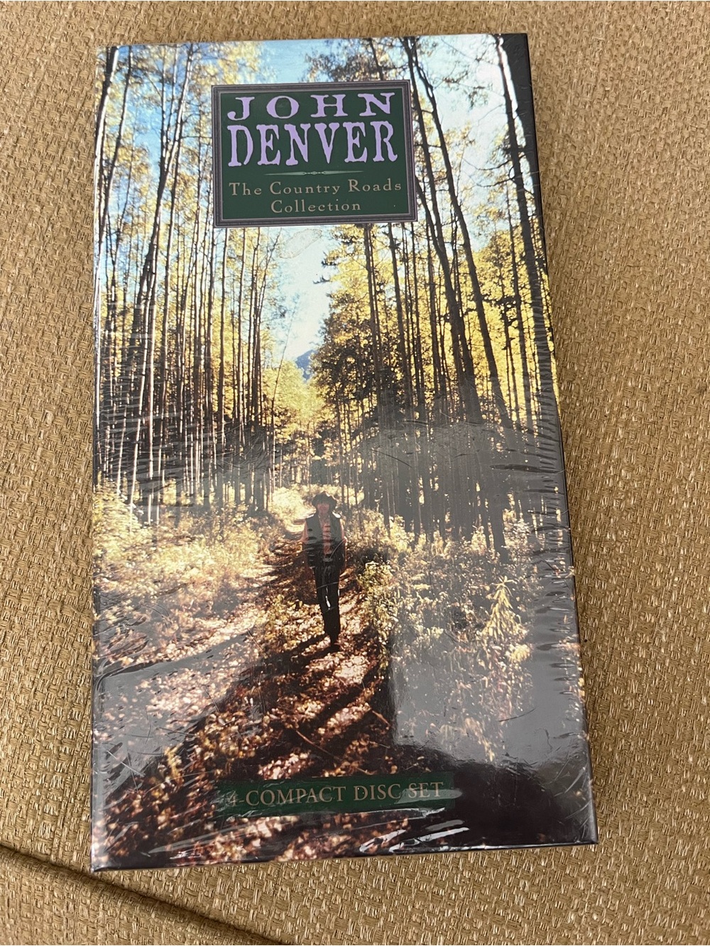 John Denver 4 CD set.  Country Roads Collection - New in sealed package.